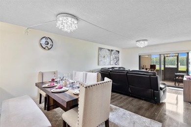 Welcome to this stunning 2-bed 2-bath condo located on the first - photo 8