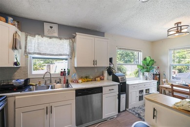 Welcome to the desirable Meadowlawn neighborhood. This - photo 8