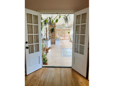This beautiful home has it all! There is a sunroom with wet bar - photo 23