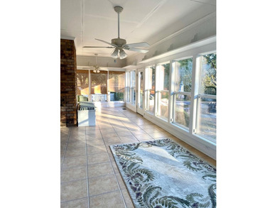 This beautiful home has it all! There is a sunroom with wet bar - photo 33