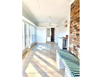 This beautiful home has it all! There is a sunroom with wet bar - photo 34