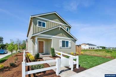 This well-designed two-story home offers an open and inviting