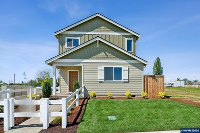 This well-designed two-story home offers an open and inviting