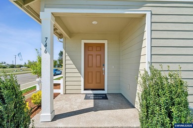 This well-designed two-story home offers an open and inviting