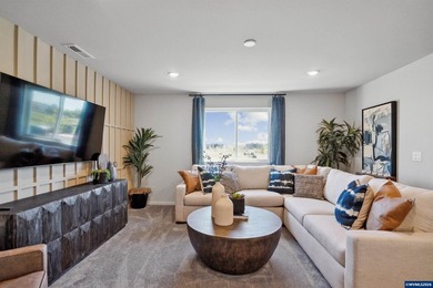 This well-designed two-story home offers an open and inviting