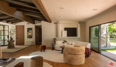 Tucked behind gates in prime Encino, this warm organic-modern - photo 11