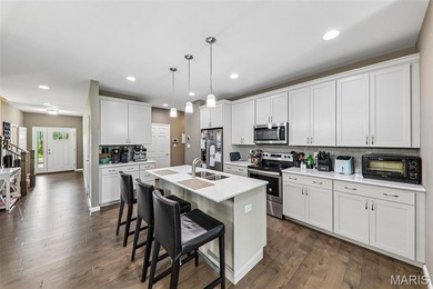 Experience elevated, low-maintenance living in this stunning - photo 11