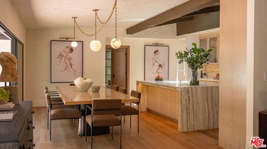 Tucked behind gates in prime Encino, this warm organic-modern - photo 12