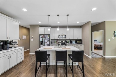 Experience elevated, low-maintenance living in this stunning - photo 13
