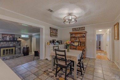 Welcome home to 902 N 75th Avenue, a charming property that - photo 13