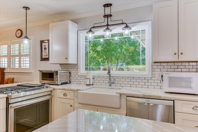 Nestled on just over an acre in a quiet, private setting near - photo 14