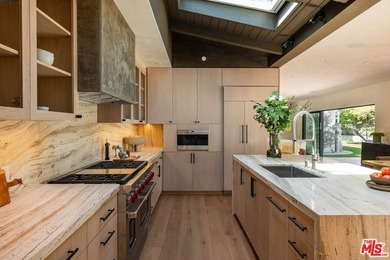 Tucked behind gates in prime Encino, this warm organic-modern - photo 14