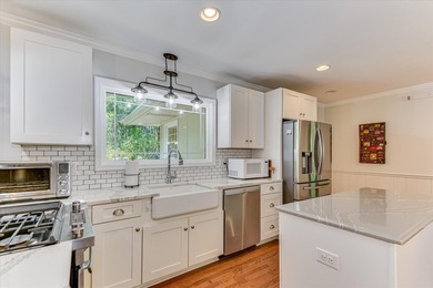 Nestled on just over an acre in a quiet, private setting near - photo 15