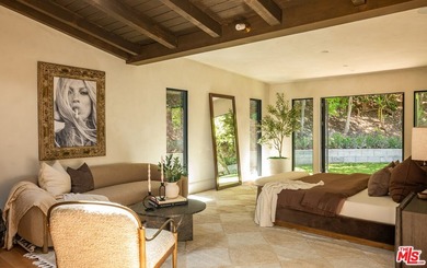 Tucked behind gates in prime Encino, this warm organic-modern - photo 17