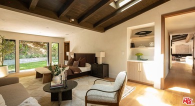 Tucked behind gates in prime Encino, this warm organic-modern - photo 18
