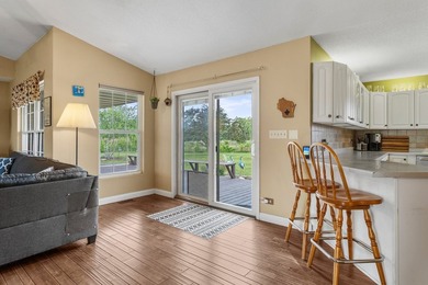 Set back on 5.38 waterfront acres in Mahomet, this custom-built - photo 18