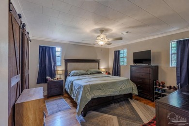 Welcome home to 902 N 75th Avenue, a charming property that - photo 18