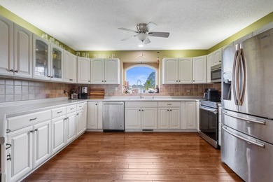 Set back on 5.38 waterfront acres in Mahomet, this custom-built - photo 20
