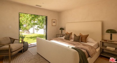 Tucked behind gates in prime Encino, this warm organic-modern - photo 21