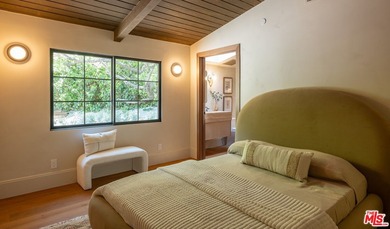 Tucked behind gates in prime Encino, this warm organic-modern - photo 23