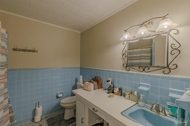 Welcome home to 902 N 75th Avenue, a charming property that - photo 23