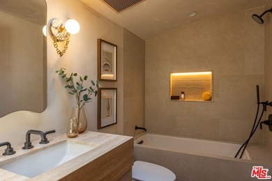 Tucked behind gates in prime Encino, this warm organic-modern - photo 24