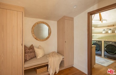 Tucked behind gates in prime Encino, this warm organic-modern - photo 27