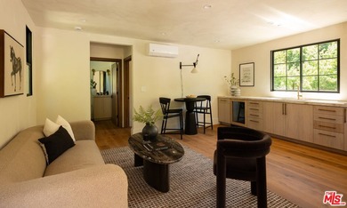 Tucked behind gates in prime Encino, this warm organic-modern - photo 32