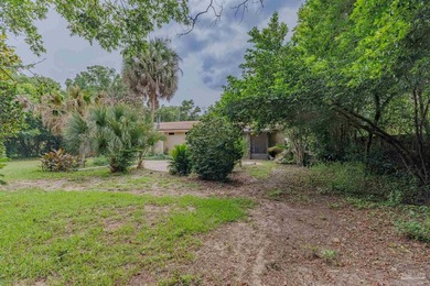 Welcome home to 902 N 75th Avenue, a charming property that - photo 33