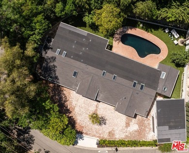 Tucked behind gates in prime Encino, this warm organic-modern - photo 34