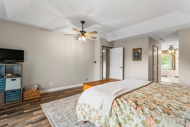 Set back on 5.38 waterfront acres in Mahomet, this custom-built - photo 34