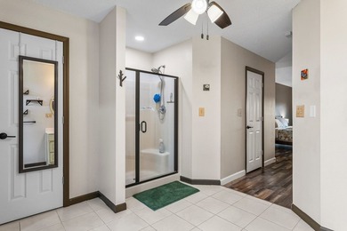 Set back on 5.38 waterfront acres in Mahomet, this custom-built - photo 37