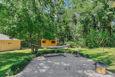 Nestled on just over an acre in a quiet, private setting near - photo 38