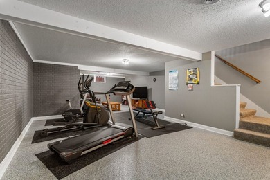 Set back on 5.38 waterfront acres in Mahomet, this custom-built - photo 39
