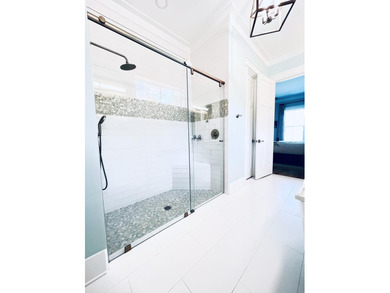 As you walk into this custom build you'll enjoy open living at - photo 40
