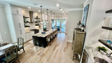 As you walk into this custom build you'll enjoy open living at - photo 48
