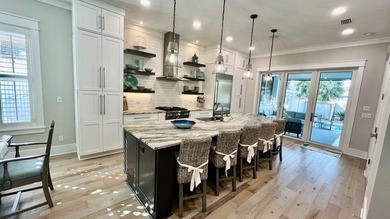 As you walk into this custom build you'll enjoy open living at - photo 49