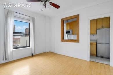 Perched on the top floor of a beautiful Beaux Arts style - photo 3