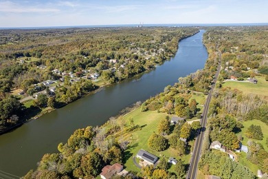 A truly special property! Enjoy stunning river views year-round - photo 47