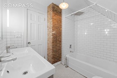 Charming Two-Family Home with Expansive Backyard and Converted - photo 7