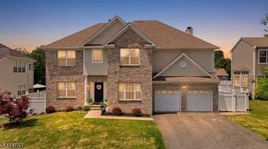 Experience refined living in this exceptional center hall - photo 1