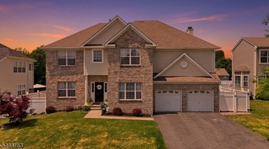 Experience refined living in this exceptional center hall - photo 5