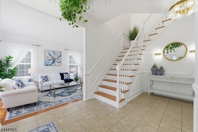 Experience refined living in this exceptional center hall - photo 8