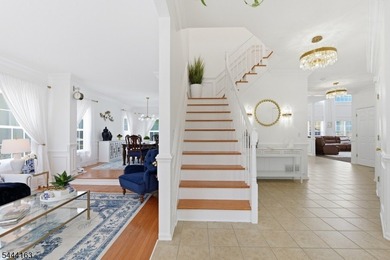 Experience refined living in this exceptional center hall - photo 9