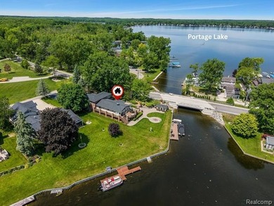 Situated in one of the most coveted waterfront settings on the - photo 4