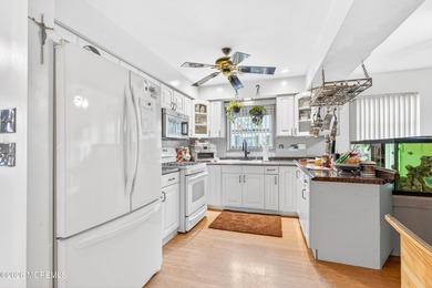 Welcome to this sought-after Castle Harbor model nestled within - photo 11