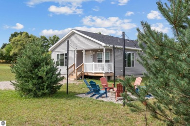 Lake Home For Sale in Rapid City, Michigan