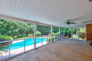 A private inground pool, spacious screened porch, and impressive - photo 2