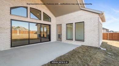 Entryway opens into the large family room which boasts a wood - photo 7