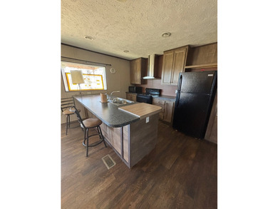Spacious 4BR/2BA home situated on a 0.69-acre lot offering - photo 11